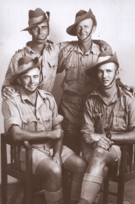 Keith McManus is seated on the right.